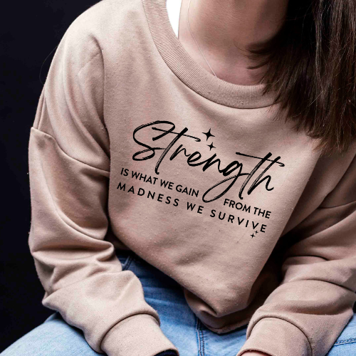 Strength is what we gain Crewneck