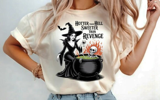 Halloween shirt with witch in black gown, skeleton in cauldron, flames, and text “Hotter Than Hell, Sweeter Than Revenge