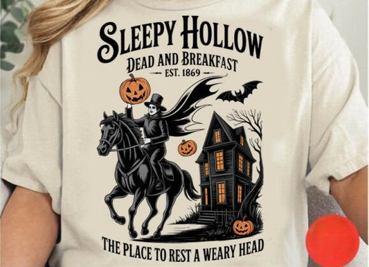 Sleepy Hollow Bed and Breakfast Halloween shirt with Headless Horseman, haunted house, pumpkins, and bats